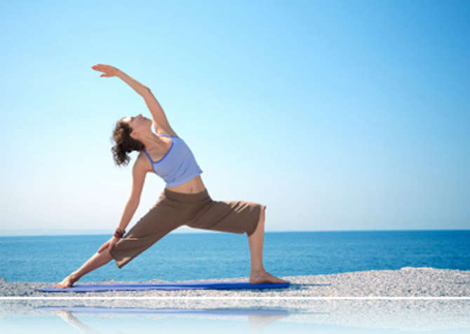 Yoga, relax sulla spiaggia